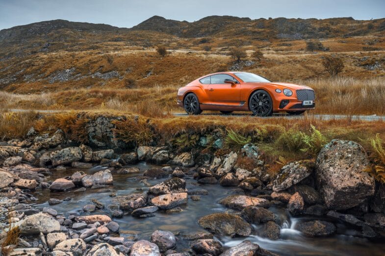 Bentley Continental GT Mulliner, turuncu renk, yandan görünüm